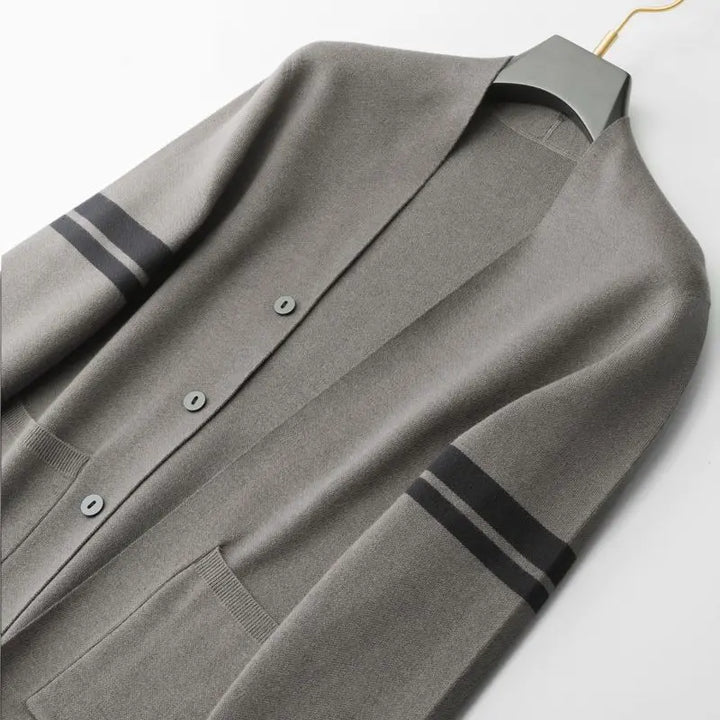 Casual women's striped cardigan in a classic design. Warm, soft sweater for effortless layering and everyday fashion.