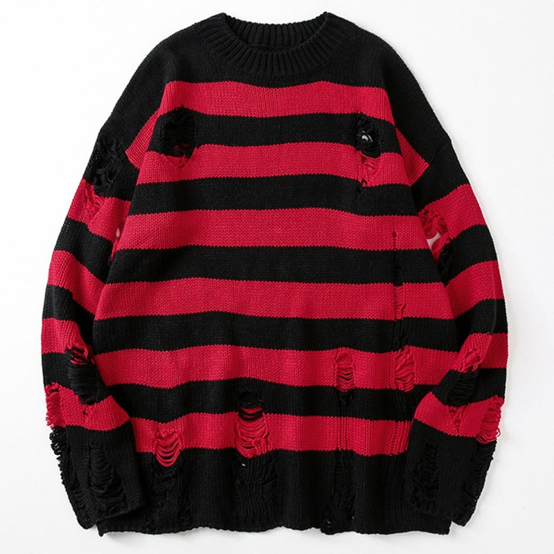 Women's cozy striped loose-knit sweater with ripped design, ideal for casual fall fashion & comfort.