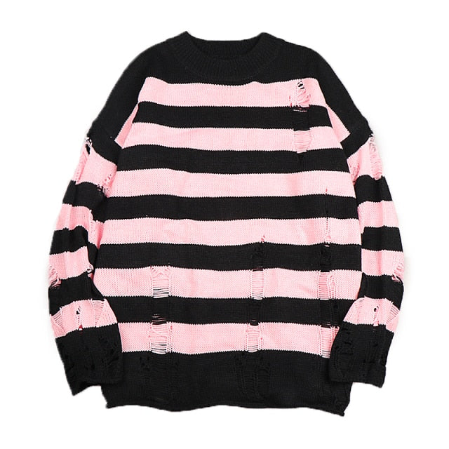 Comfortable women's loose striped sweater with ripped details, perfect for cozy winter wear & versatile style.