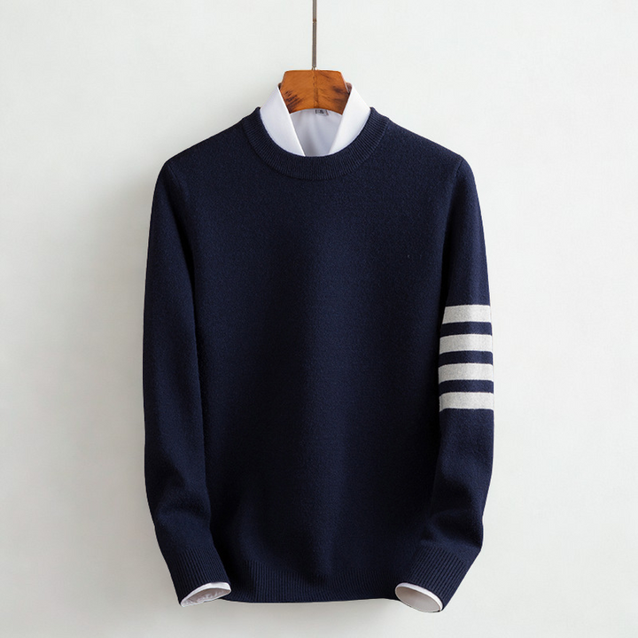Model wearing a women's cozy striped long sleeve pullover sweater, styled for a chic fall and winter look.