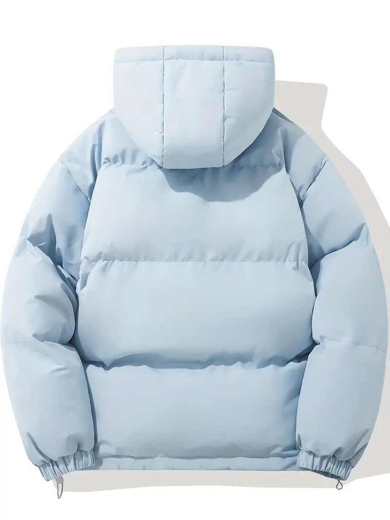 Side profile of a women's stylish hooded winter coat. Warm, cozy outerwear for casual and cold conditions.