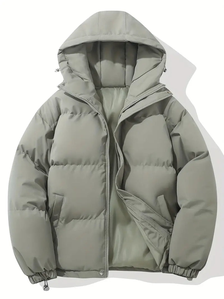 Women's cozy long-sleeve winter jacket with a protective hood. Stylish & warm outerwear for cold climates.