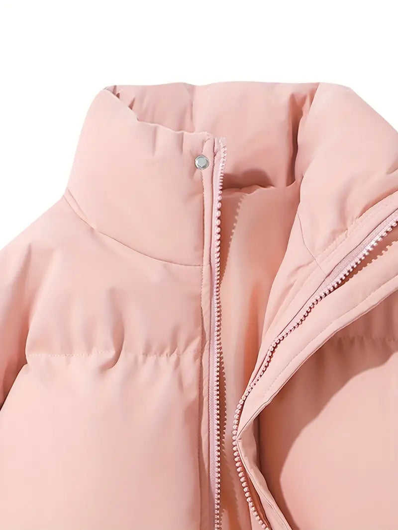 Fashionable women's long-sleeve winter jacket with a cozy hood. Stylish outerwear for casual comfort.