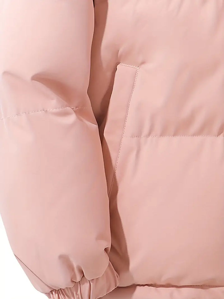 Warm women's hooded winter coat, perfect for chilly days. Cozy & stylish long-sleeve outerwear for everyday.