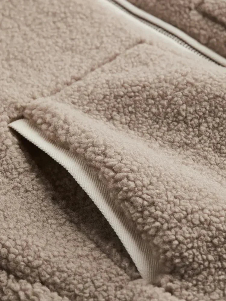 Oversized women's teddy coat offering plush warmth and effortless style for cozy fall fashion.