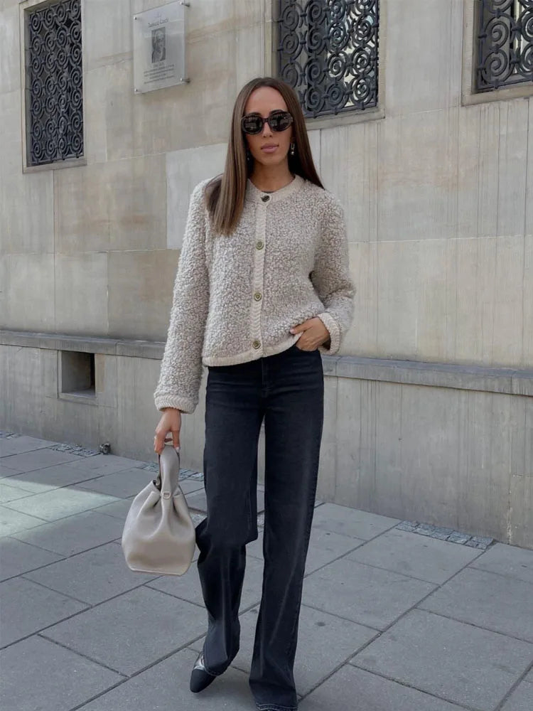 Versatile women's teddy fleece vest, perfect for layering & winter fashion. A comfy, warm fleece cardigan.