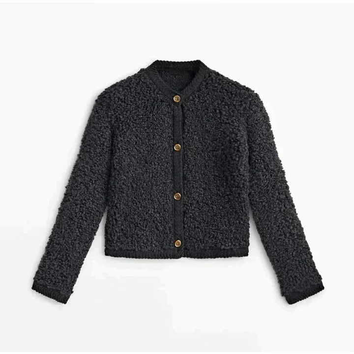 Chic women's teddy fleece vest, a warm layering cardigan for cozy winter fashion outerwear.
