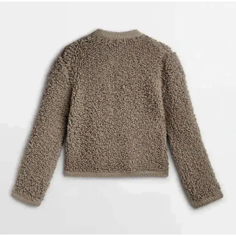 Textured women's teddy fleece vest, soft & cozy for cold weather layering. A stylish fleece outerwear.