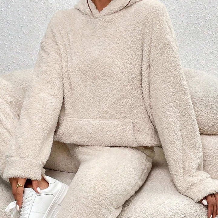 Women's cozy teddy loungewear set with hood. Soft, comfortable two-piece for ultimate relaxation.