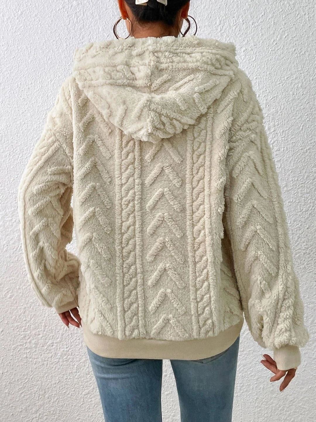 Soft women's pullover hoodie, a comfortable layering piece with a relaxed fit for cozy, chic everyday style.