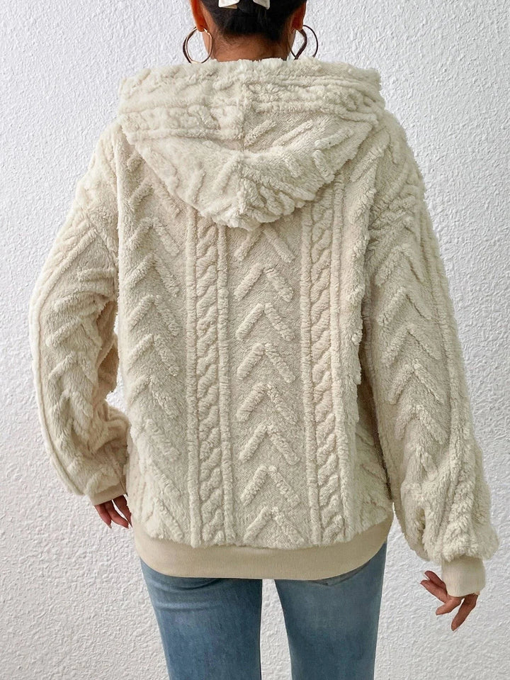 Soft women's pullover hoodie, a comfortable layering piece with a relaxed fit for cozy, chic everyday style.