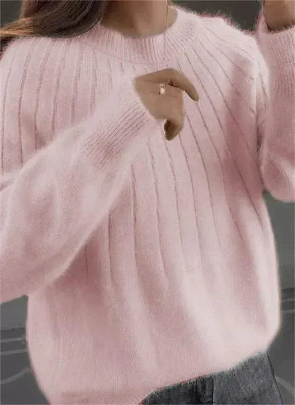 Comfortable women's textured long sleeve crew neck pullover, ideal for cozy everyday wear.