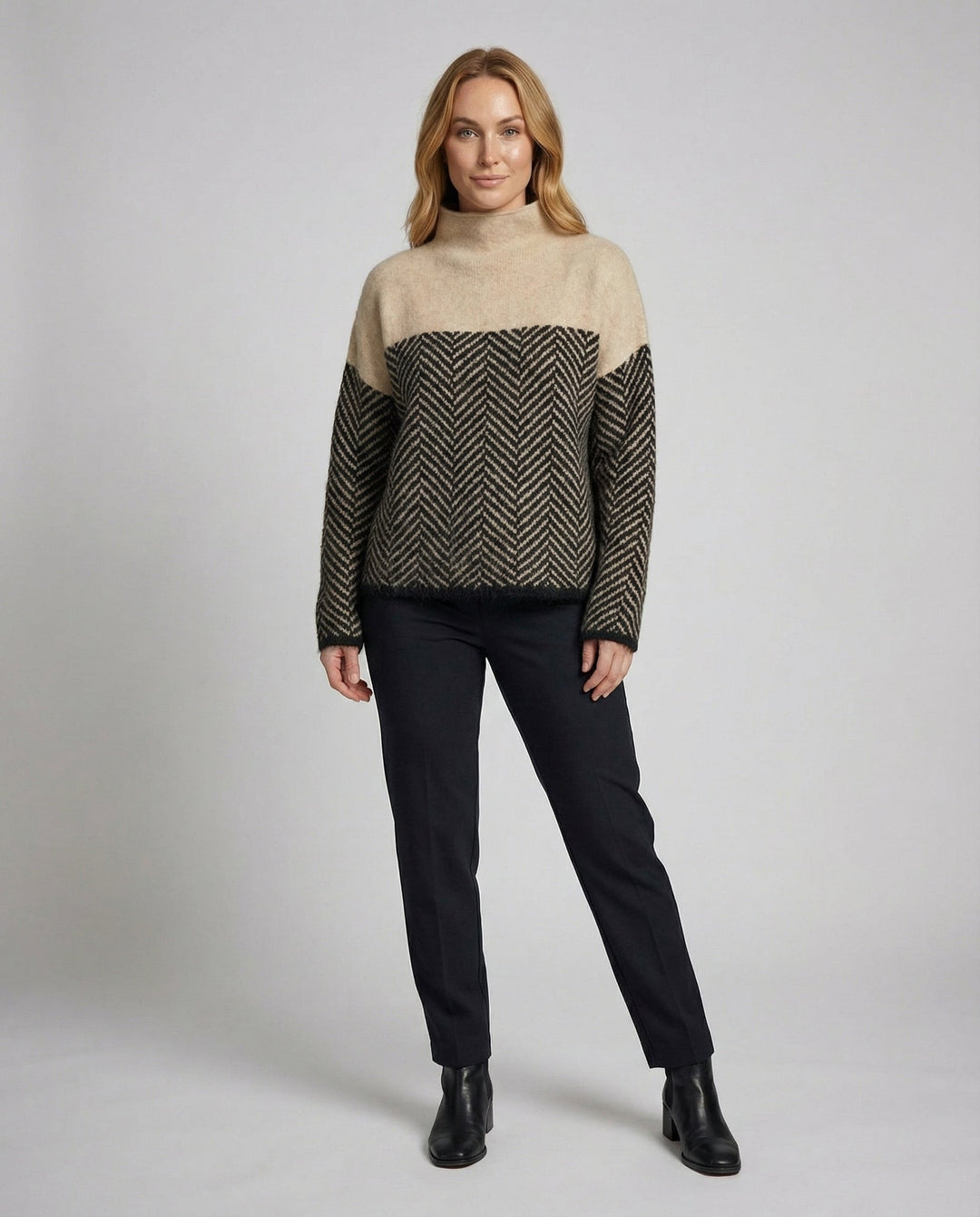 Women's cozy textured turtleneck sweater, perfect for elegant warmth in winter and fall fashion.