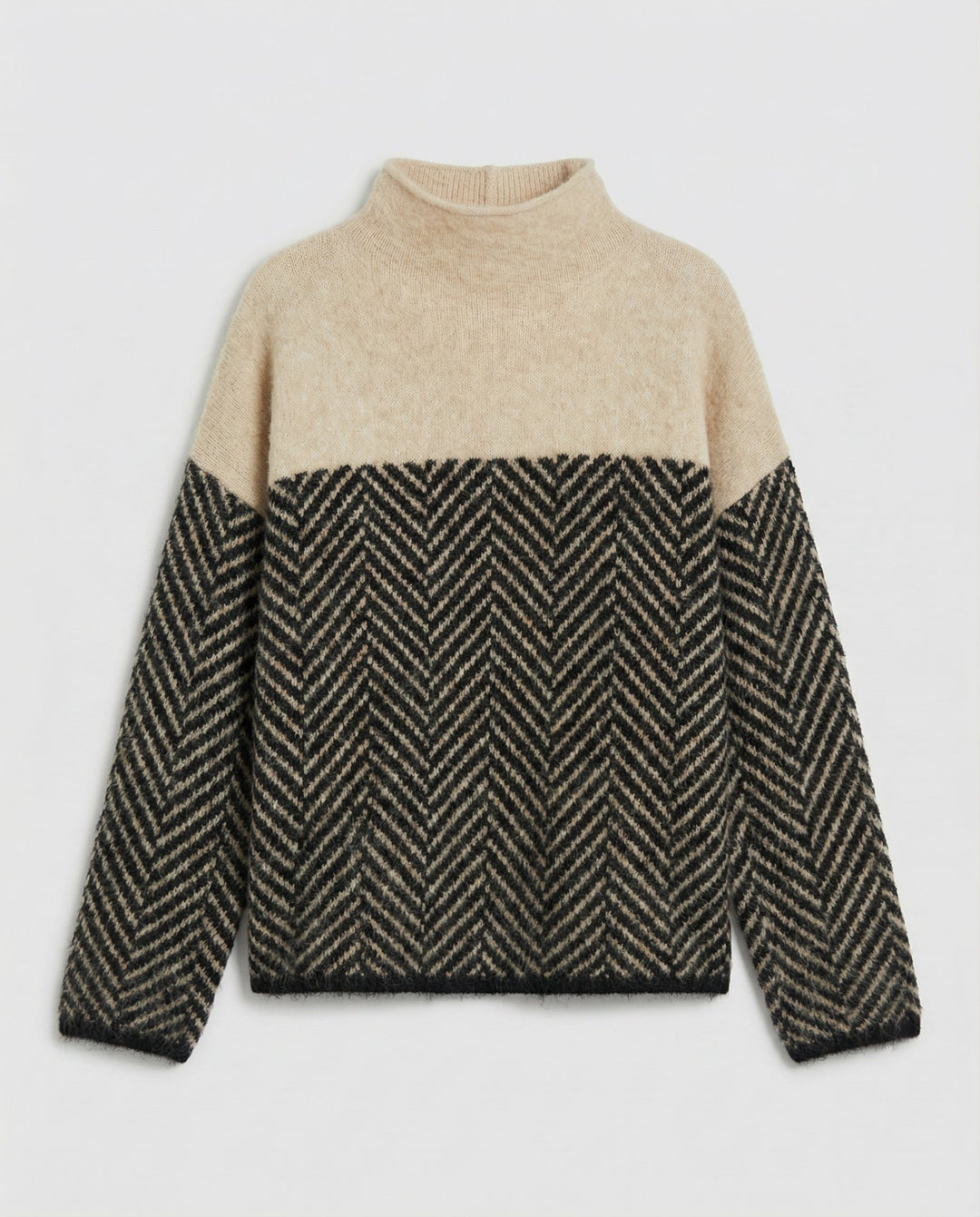 Warm women's loose-fit turtleneck sweater, featuring a stylish textured knit for cozy fall & winter fashion.