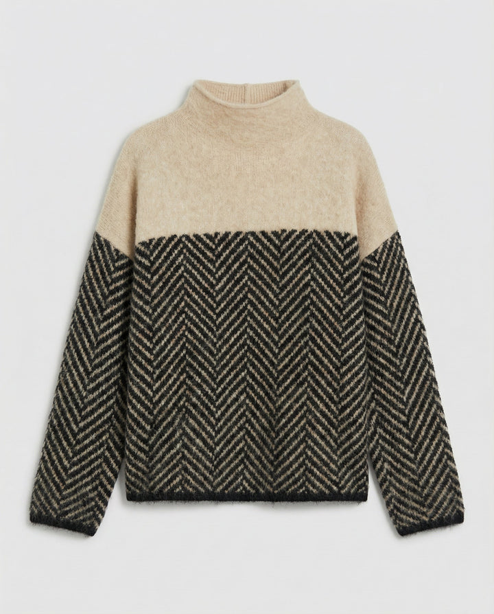Warm women's loose-fit turtleneck sweater, featuring a stylish textured knit for cozy fall & winter fashion.