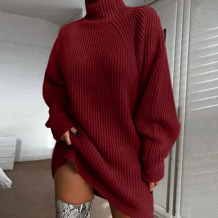 Elegant women's winter fashion: a warm turtleneck midi dress with comfortable long sleeves.