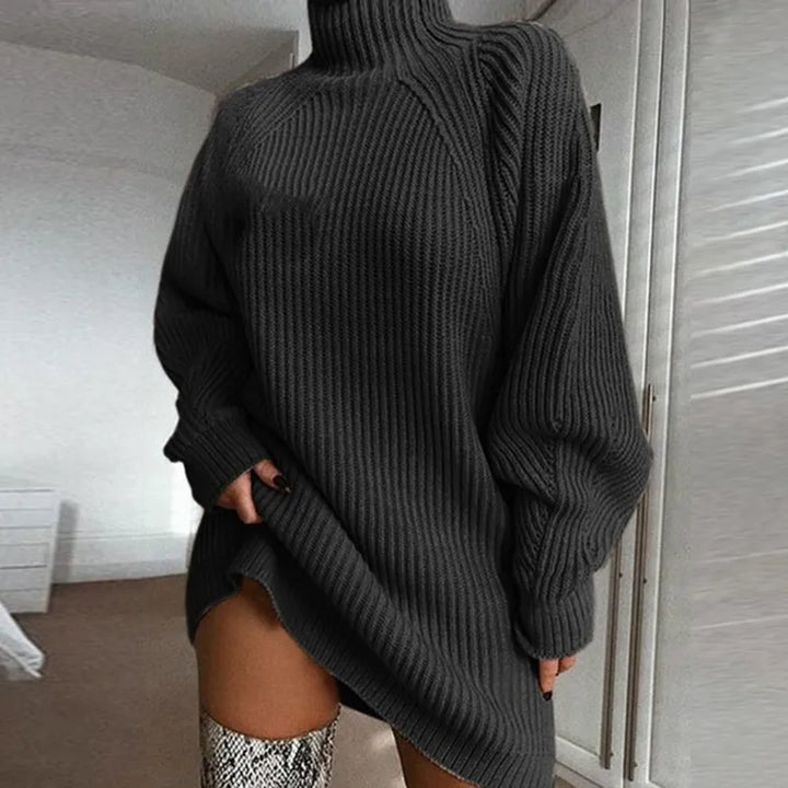 Comfortable women's long sleeve midi dress. Cozy turtleneck design for stylish winter warmth.