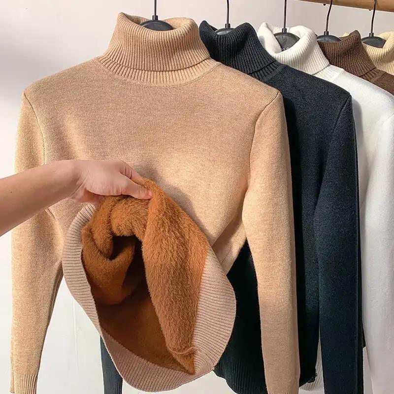 Elegant women's turtleneck sweater, a comfy long-sleeve top for chic winter style.