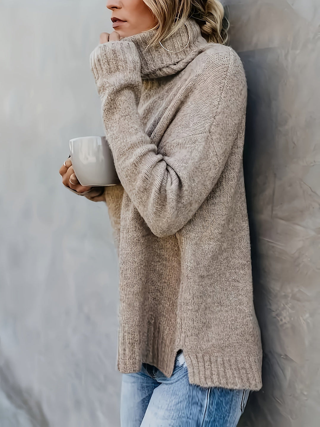 Winter wear: Women's comfortable relaxed fit turtleneck sweater with trendy side split hem.