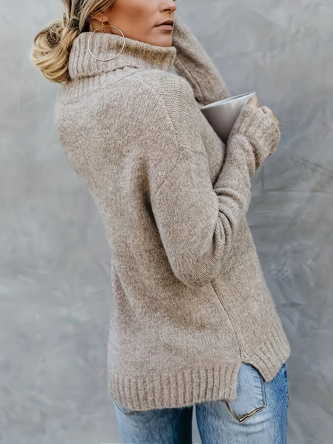 Comfortable women's long sleeve turtleneck sweater, relaxed fit, side split hem, ideal for daily wear.