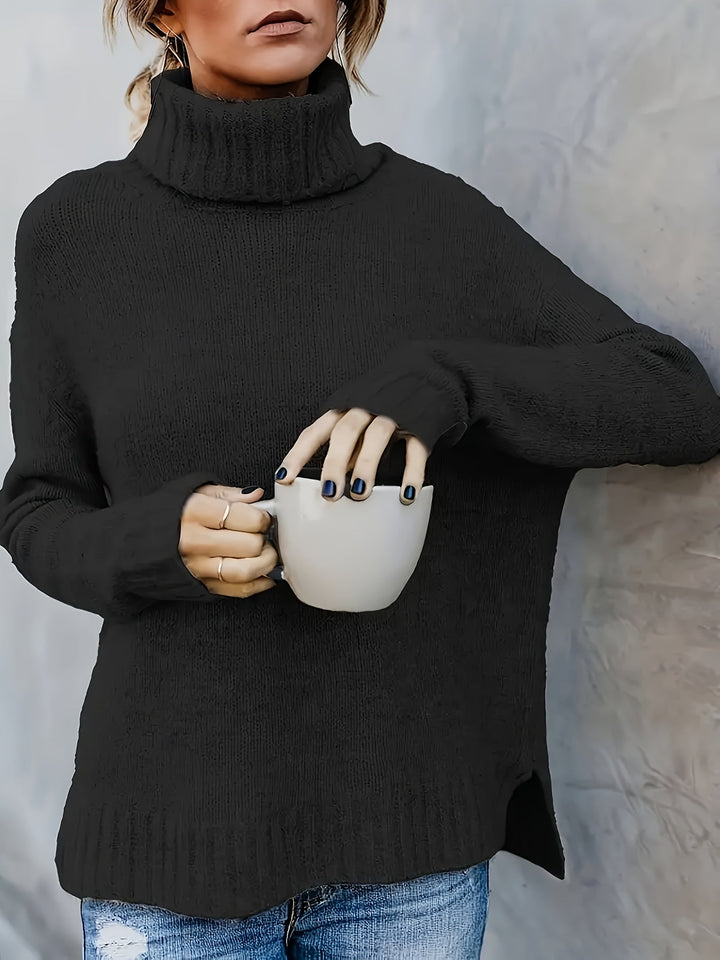Chic women's cozy turtleneck sweater, relaxed fit, side split hem. Essential for cool weather style.