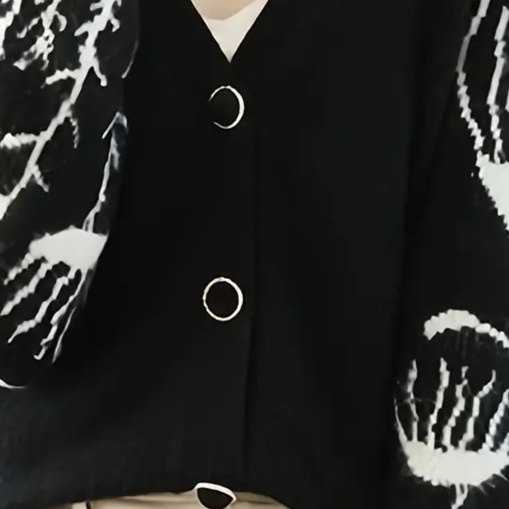 Soft knit women's V-neck cardigan, versatile layering for elegant fall outfits & winter fashion.