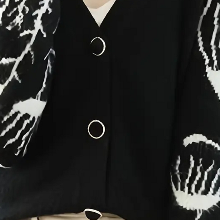 Soft knit women's V-neck cardigan, versatile layering for elegant fall outfits & winter fashion.