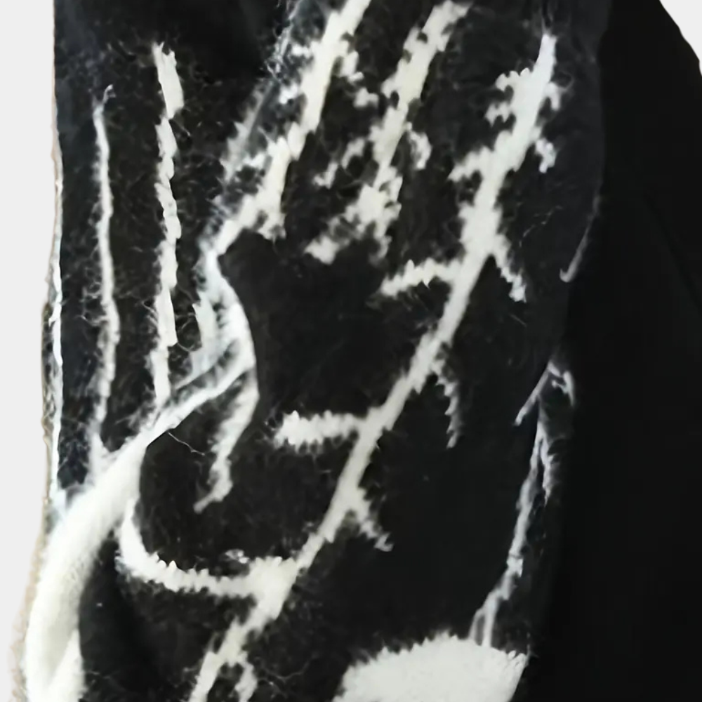 Women's V-neck cardigan with soft, cozy knit fabric, ideal for comfortable winter layering.