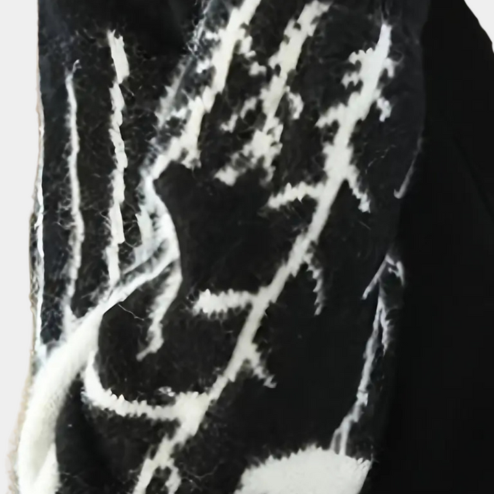 Women's V-neck cardigan with soft, cozy knit fabric, ideal for comfortable winter layering.