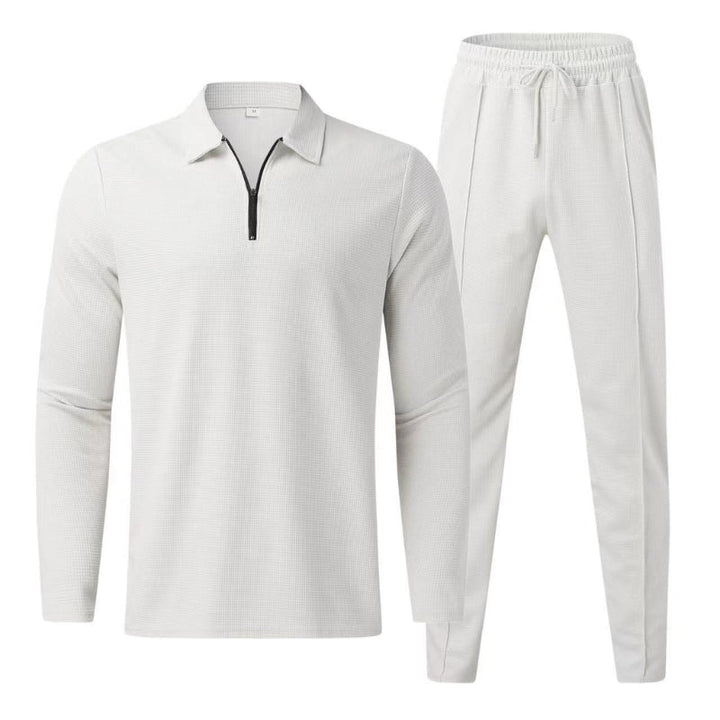 Ultra-cozy women's waffle knit two-piece set. Warm jogger & zip-top loungewear for ultimate comfort.