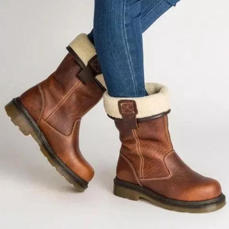Women's cozy warm slip-on ankle boots. Ideal for cold winter weather, offering comfort and style.