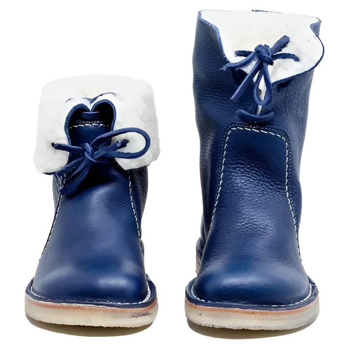 Warm women's waterproof winter boots, wool-lined, lace-up, and comfortable. Perfect for snowy weather and everyday wear.