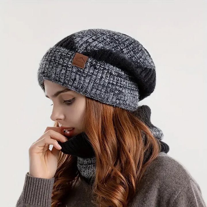 Practical women's warm beanie and scarf set, an ideal winter gift for cold weather.