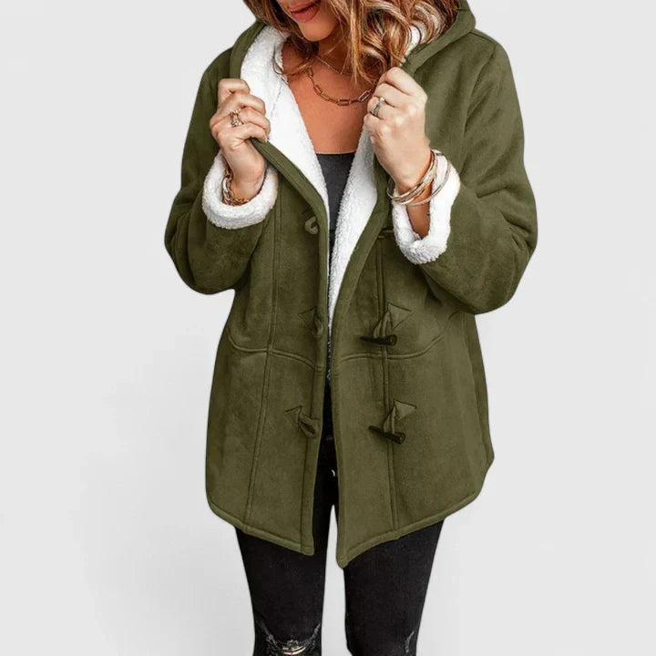 Soft & cozy women's winter coat featuring stylish toggle closure. Perfect hooded outerwear for cold weather.