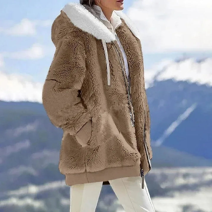 Women's fall fashion jacket, hooded and zippered, perfect for layering in cold weather.