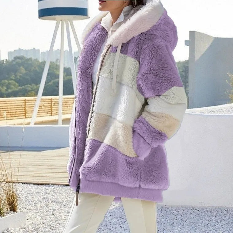 Practical women's hooded winter jacket with zipper, designed for comfort and everyday warmth.