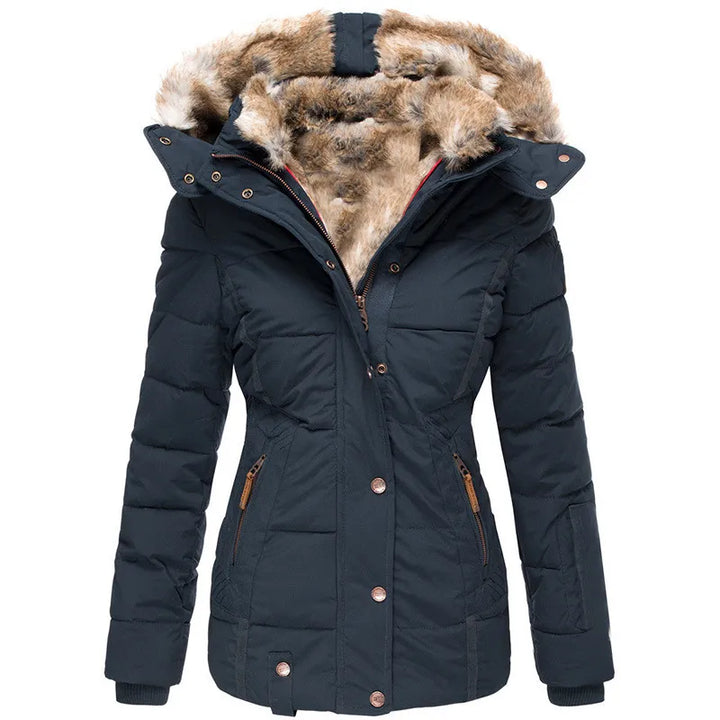 Plus size women's cozy winter jacket with plush hood trim. Stylish, warm outerwear for cold weather.