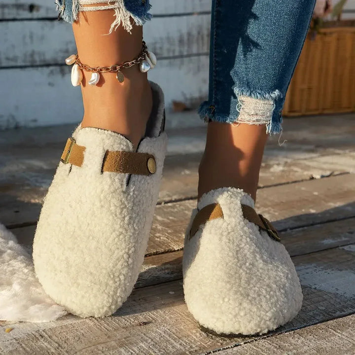 Women's cozy winter mules, warm anti-slip indoor shoes for ultimate comfort & home wear.