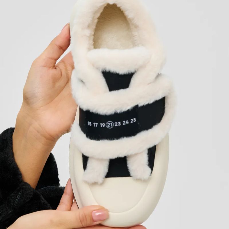 Comfortable women's slip-on winter shoes. Warm, cozy footwear with stylish strap, perfect for daily wear.