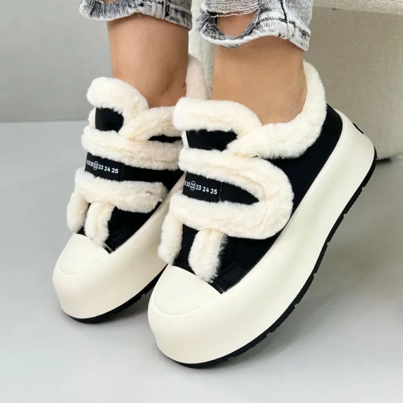 Stylish women's fall & winter slip-on shoes. Cozy, warm footwear with elegant strap detail for daily comfort.
