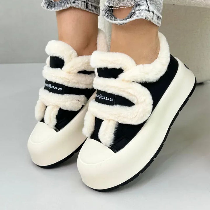 Stylish women's fall & winter slip-on shoes. Cozy, warm footwear with elegant strap detail for daily comfort.