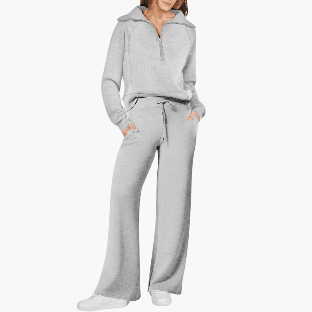 Stylish women's zip-up hoodie & wide-leg pant leisurewear set. Comfortable, relaxed fit for everyday fashion.