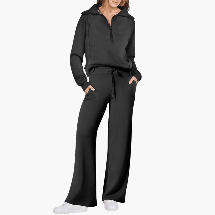 Comfortable women's zip-up hoodie and wide-leg pants. Versatile two-piece set for casual wear and leisure.