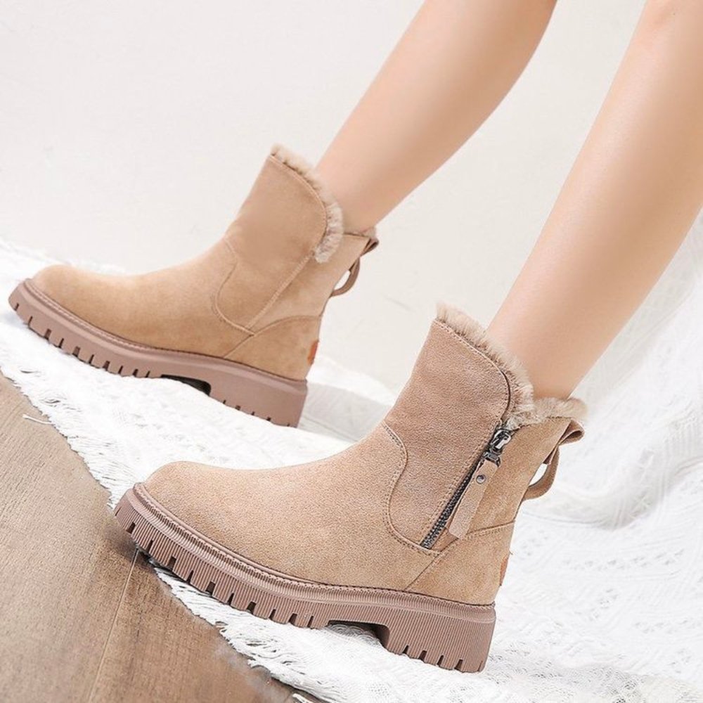 Elegant CozyStride women's insulated winter boots featuring a practical zip closure for easy wear.