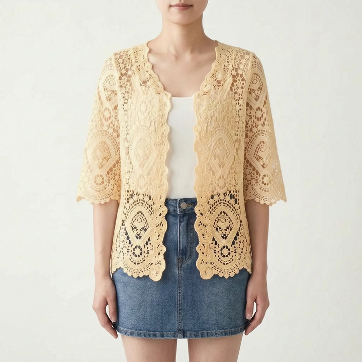 Soft women's open-front crochet-style cardigan, breathable & lightweight, a chic bohemian layer for summer evenings.