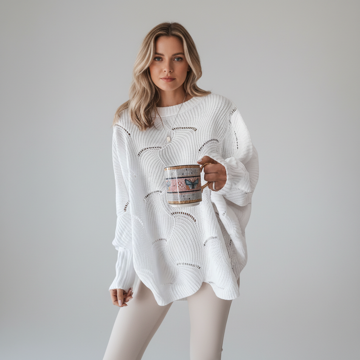 Stylish women's ribbed sweater with unique asymmetrical hem and long sleeves