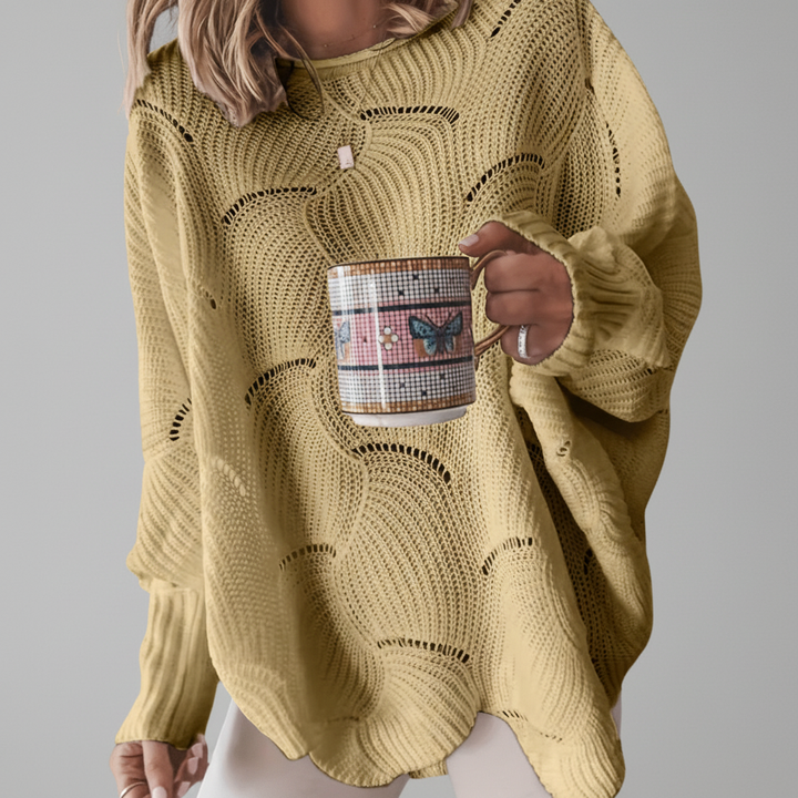 Elegant women's asymmetrical long sleeve sweater in cream, comfortable fit