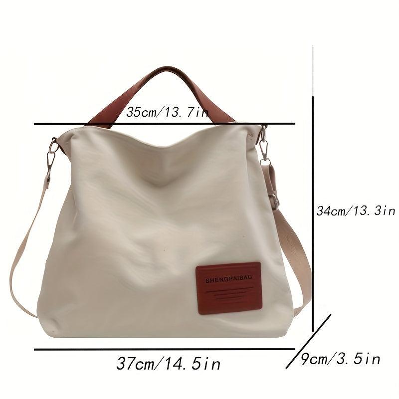Durable cream white canvas shoulder bag for women, ideal everyday accessory with versatile styling.