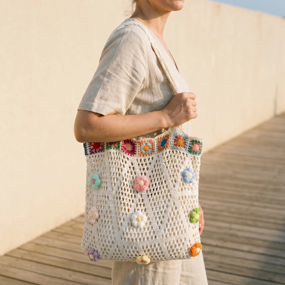 Women's crochet flower tote bag, perfect for summer. Boho style shoulder bag with floral design, lightweight & packable.