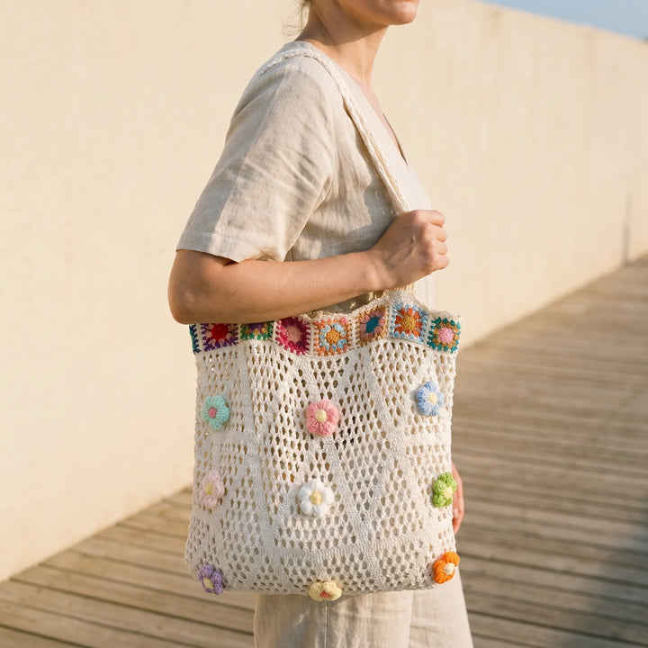 Women's crochet flower tote bag, perfect for summer. Boho style shoulder bag with floral design, lightweight & packable.
